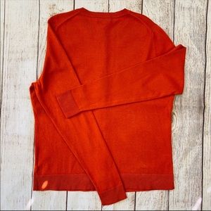 Burnt orange sweater